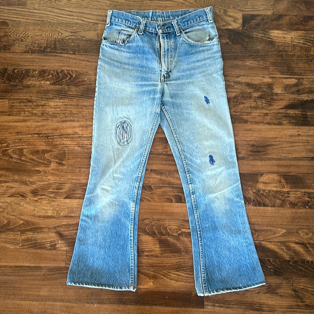 Vintage Levi’s orange tab flares with patching